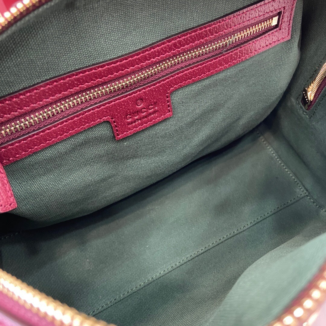 Bolso Boston Ophidia tamaño mediano.