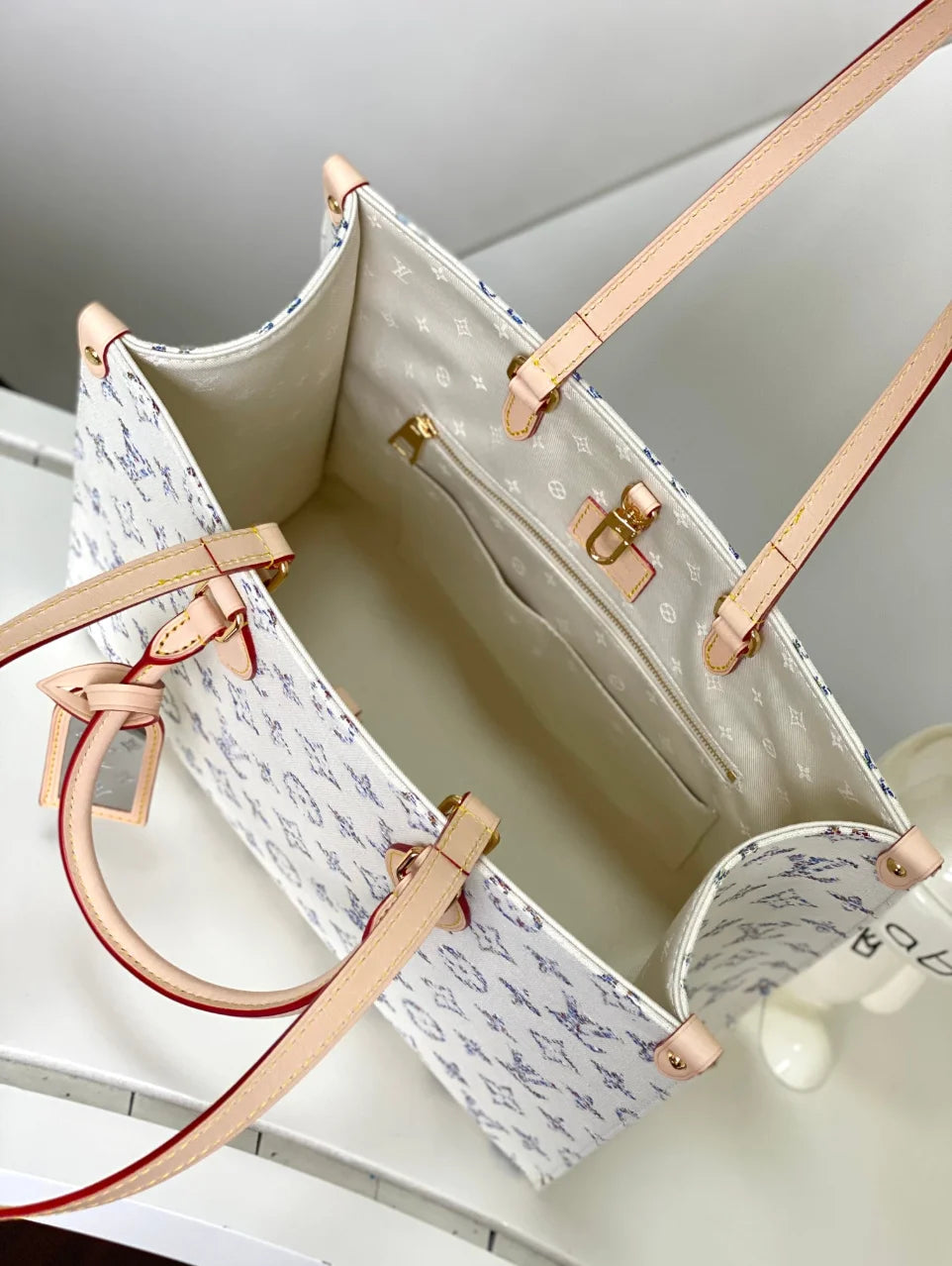 ONTHEGO MM BLANCO Y AZUL