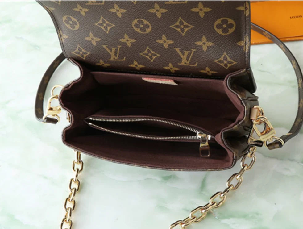 POCHETTE METIS EAST WEST